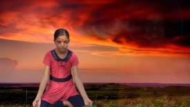 Anju meditates with Sai