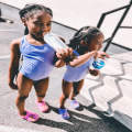 Kayce Brown and her young sister Madison after gymnastic practice 