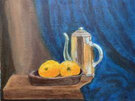Tea pot with oranges