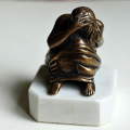 3-sitting figurine.-bronze