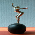 show up...silver figurine