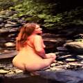 Maia Wylde on creek rock